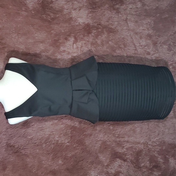 Bissou Bissou Dresses & Skirts - Bissou Bissou Peplum Sleeveless V Neck Dress